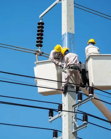 Two electricians working on power lines